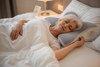 Elderly woman laying down